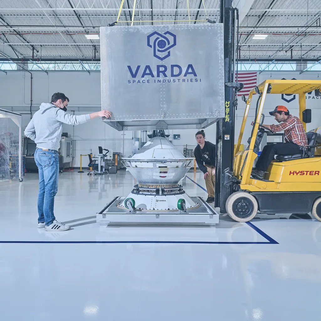 Varda team encasing capsule for shipping